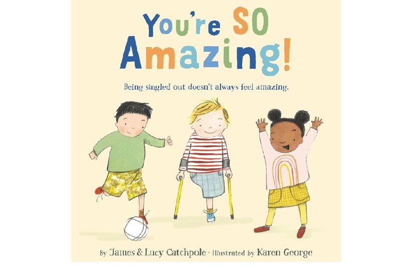 Book cover of You're So Amazing. It shows an illustration of three children. The boy on the left is kicking a football, the boy in the middle has one leg and using crutches and a girl on the right with her hands in the hair.