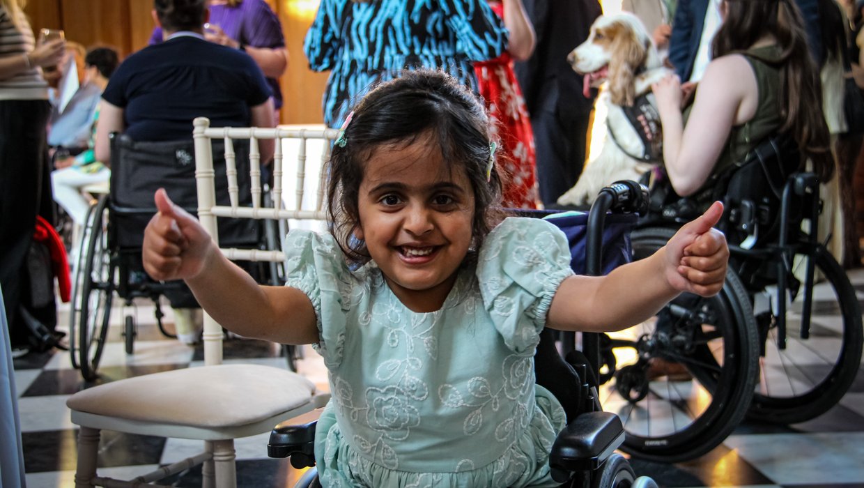 Aniyah Thumbs up Aniyah in green dress giving thumbs up