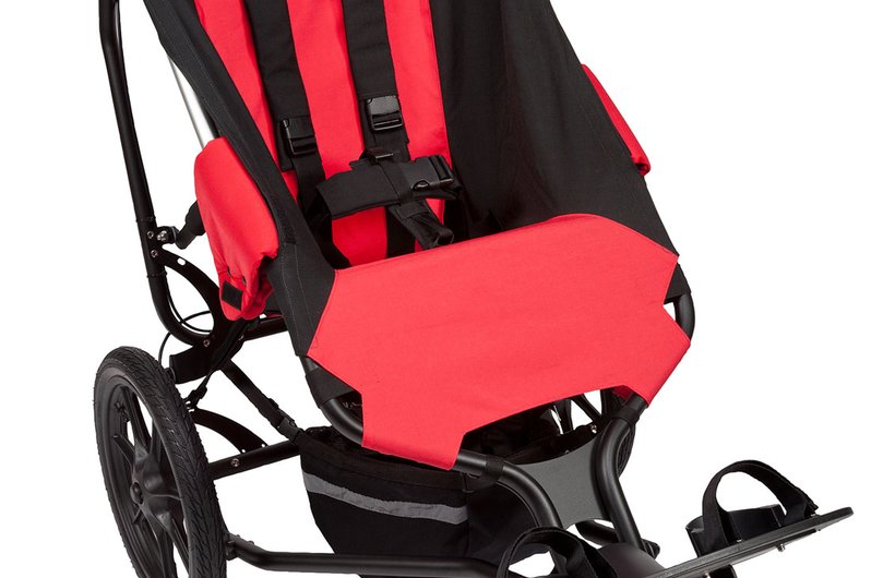 A red and black Delichon Delta special needs buggy