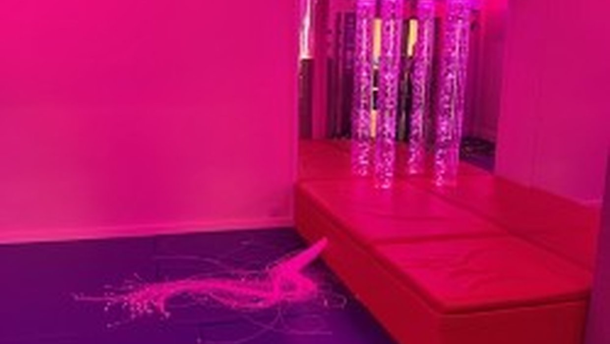 A purple and blue sensory room