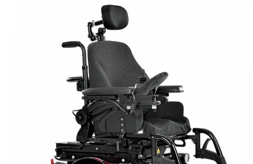 A black Q300M powered wheelchair