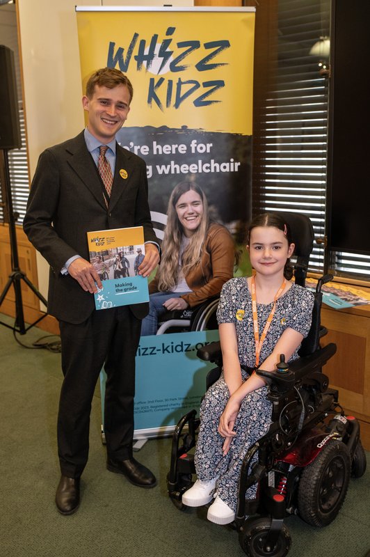 Lettie & her MP Keir Mather with education report at Westminster
