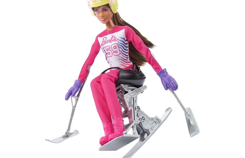 Barbie para skiing in a hot pink ski suit.