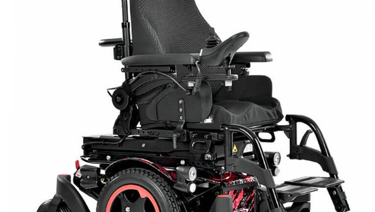 A black Q300M powered wheelchair