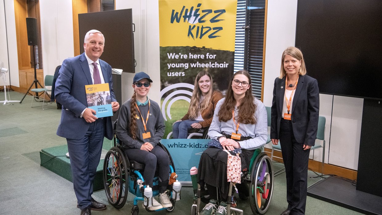 Daniel Francis MP & Whizz Kidz members with Education report